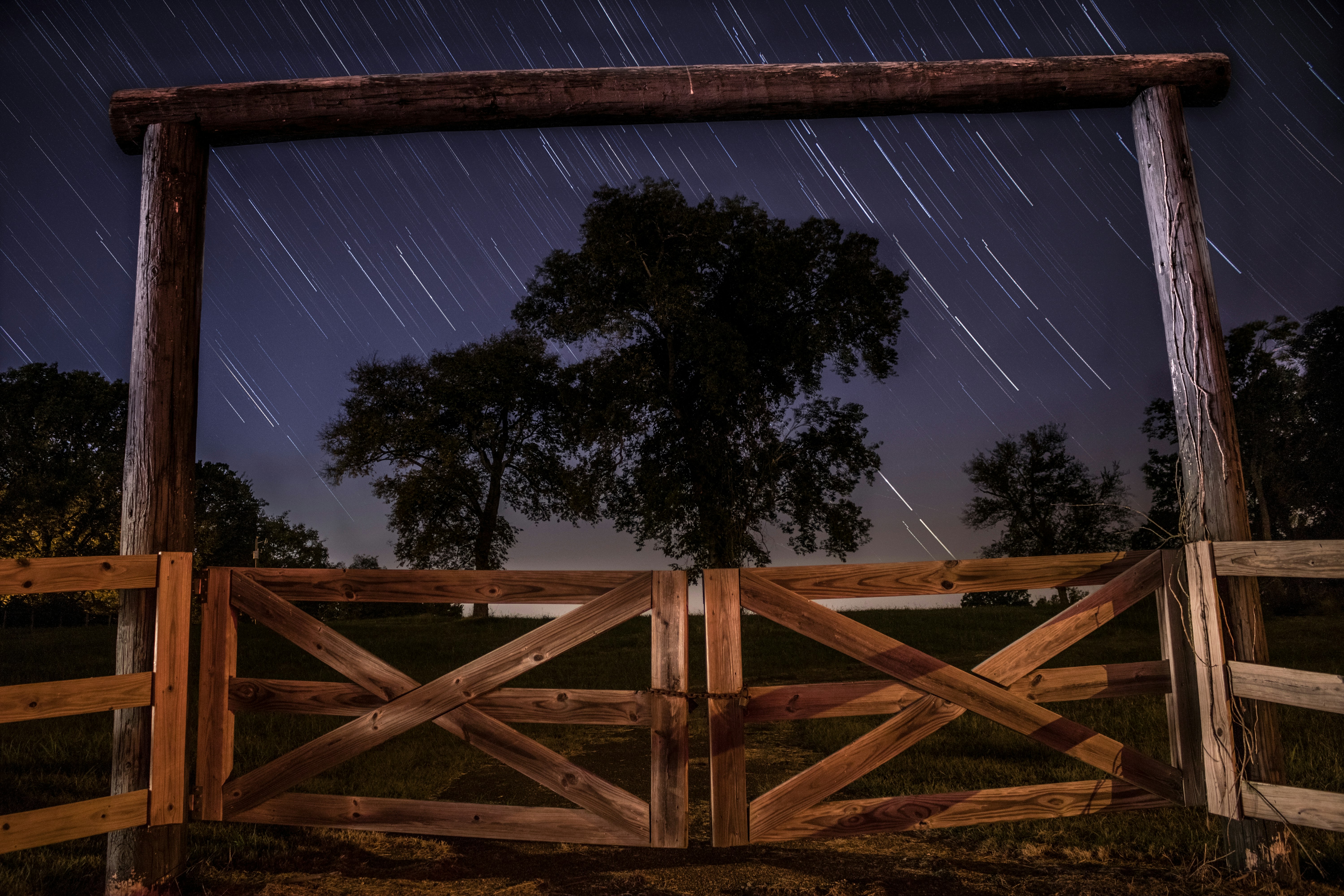 worm's eye view photography of brown wooden barn doors